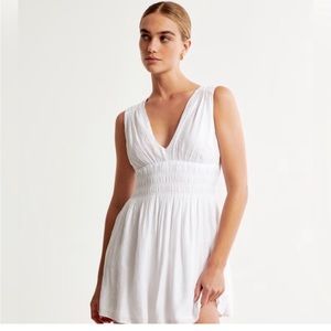 Smocked Plunge Crinkle
Mini Dress